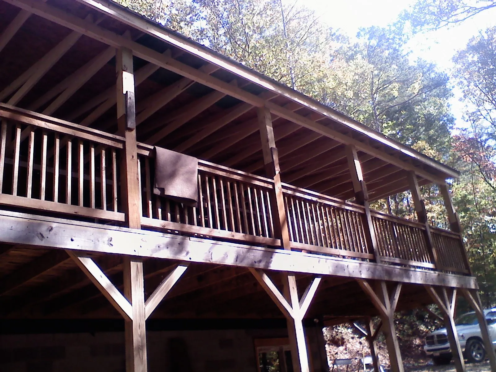 Timber framing under a new elevated porch and deck — Roof Leak Repair in Catonsville by Roofing Brothers